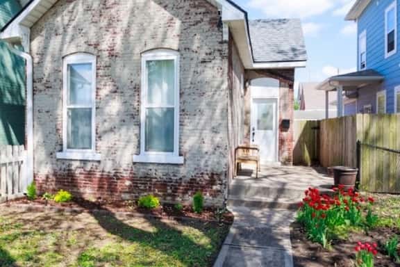Charming 1800's Tiny Cottage | Walk to Lucas Oil! - Image 1